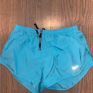 Light blue Nike running shorts